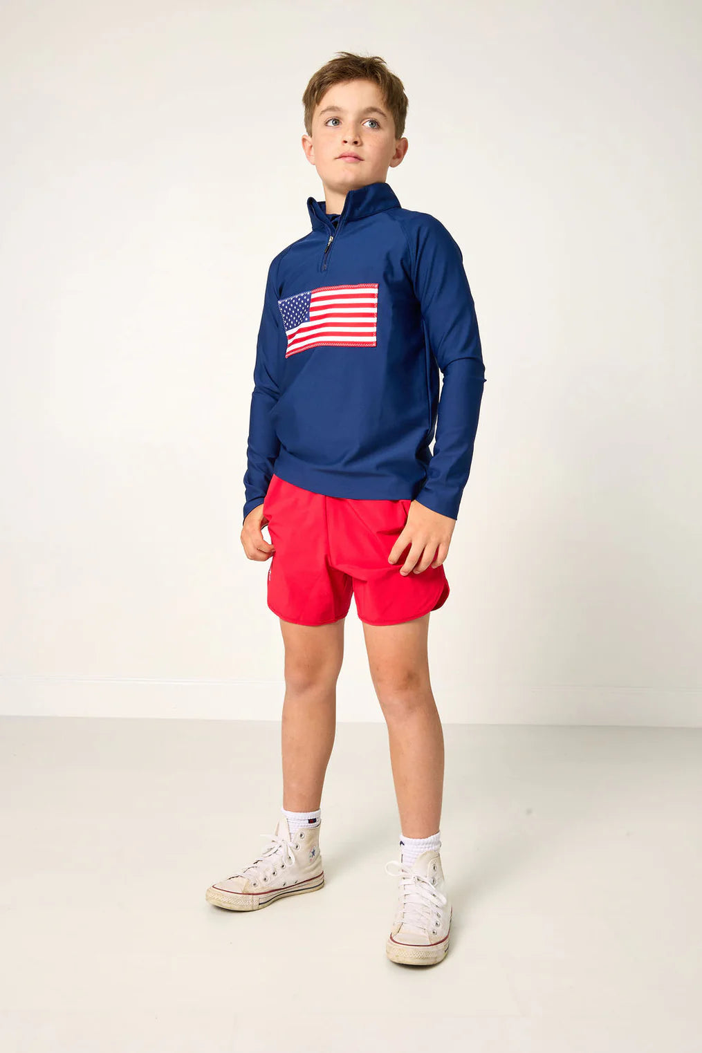 Red super short from Courtside Kids featuring a comfortable, stylish design perfect for active children.