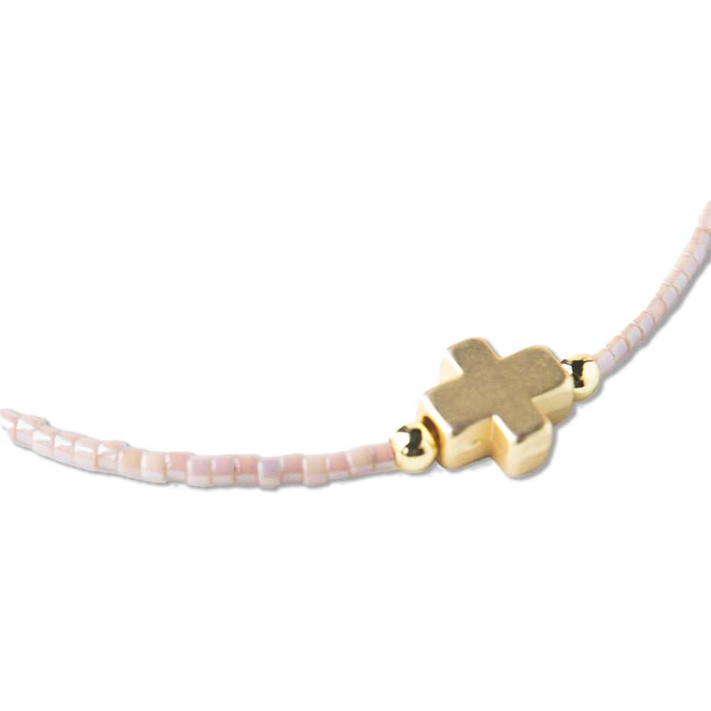 Set of delicate Faithful Bangles by Lenny & Eva featuring gold-tone metal and intricate detailing for elegant wrist accessories.