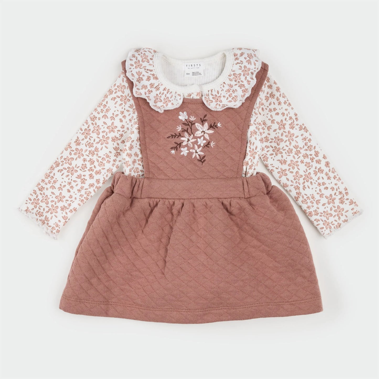 Petit Lem floral terracotta quilted overall dress with adjustable straps and a cute, textured design for stylish comfort.