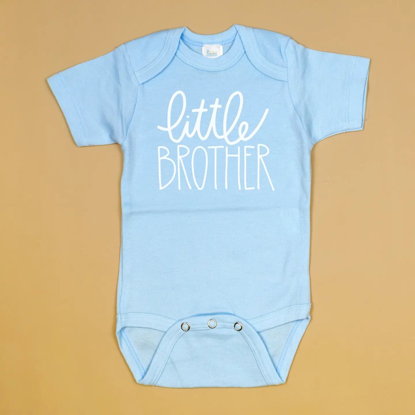 Cuddle Sleep Dream Little Brother blue onesie with long sleeves and snap closure, soft cotton fabric for baby boys.