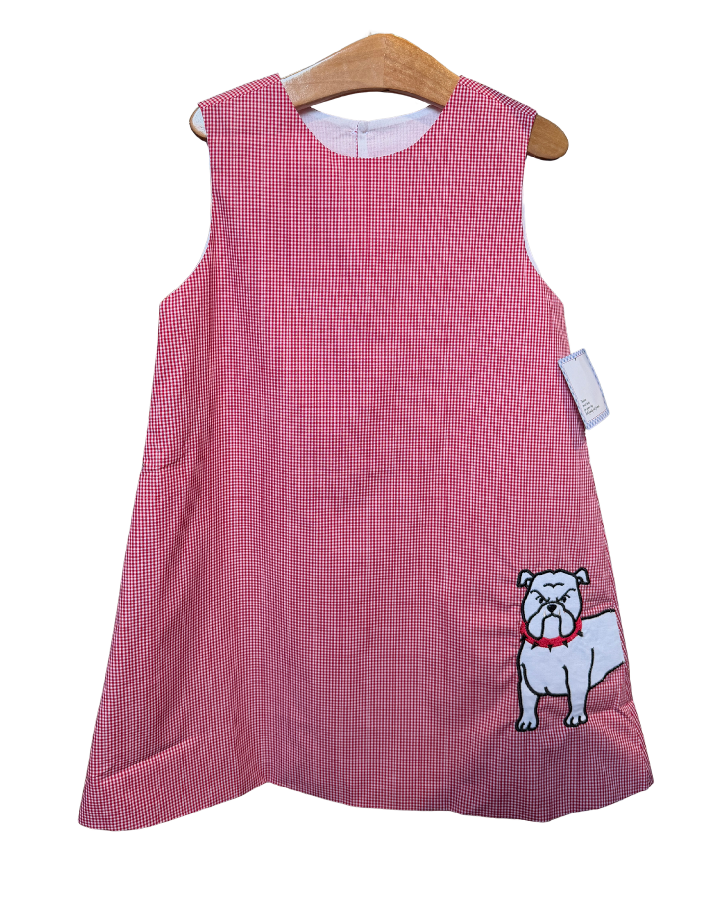 Red and white mini gingham bulldog dress by Remember Nguyen, featuring a stylish sleeveless design with a bow detail.