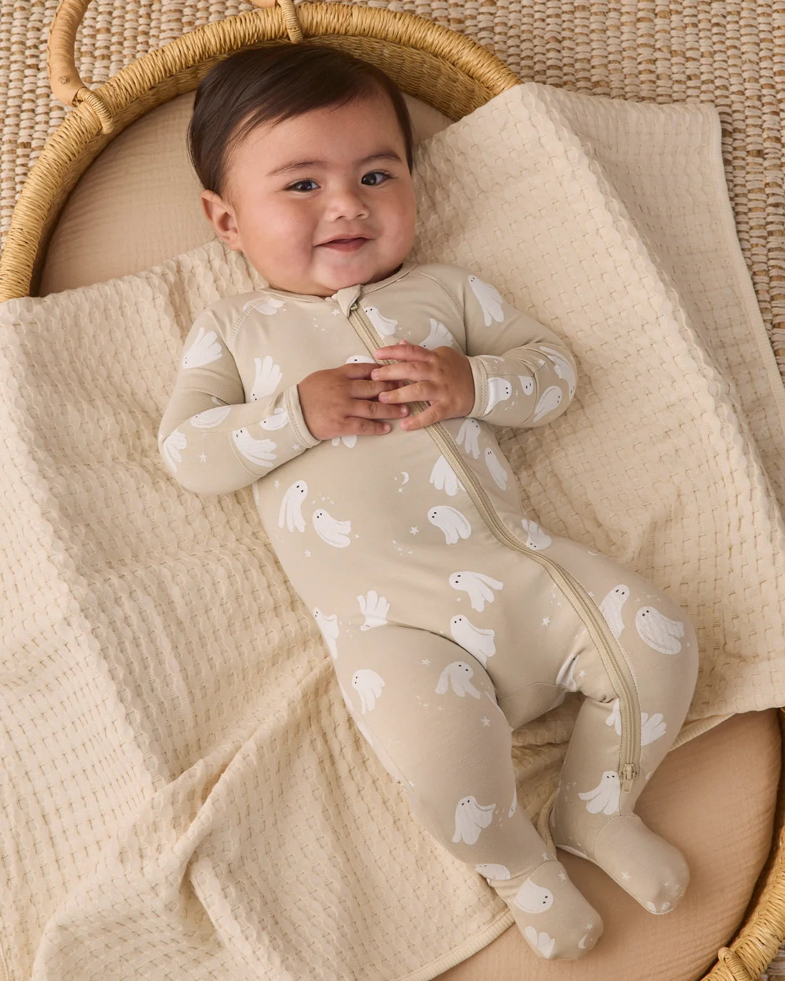 Dancing Ghost bamboo zip footie by Quincy Mae featuring a soft, cozy baby onesie with ghost print and front zipper for easy dressing.