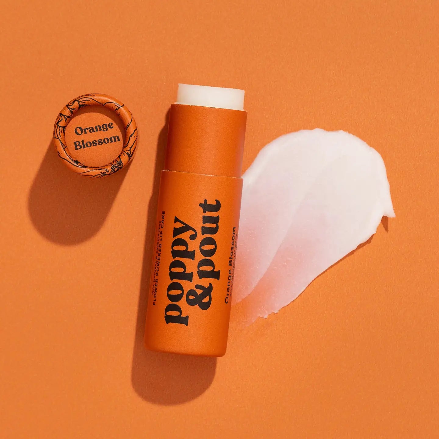 Sweet E's Children's Boutique Poppy & Pout lip balm with colorful packaging and natural ingredients, designed for gentle lip care for kids.