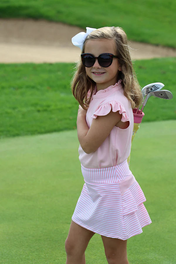 Pink and white striped Sandpearl Pink Stripe PrepleticTM Cindy Skort by The Beaufort Bonnet Company, featuring a cute, casual design.