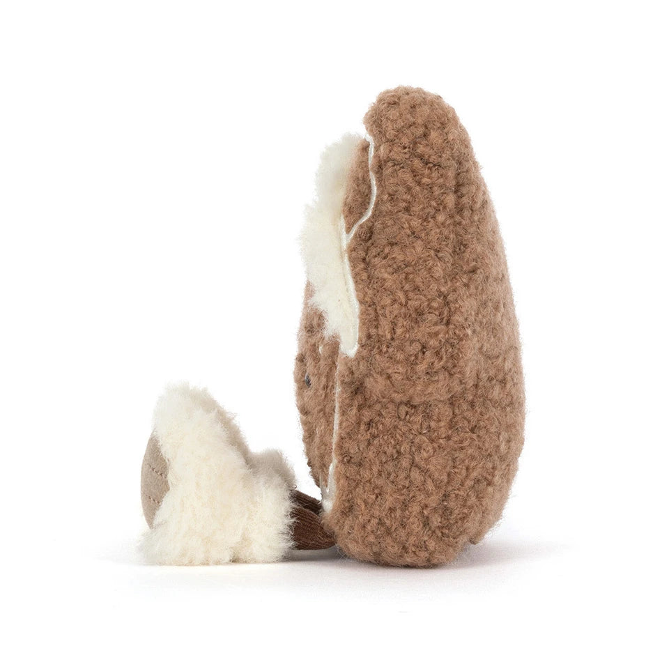 Jellycat Amuseables Molasi Cookie plush toy with soft, textured fabric and adorable cookie design, perfect for cuddling.