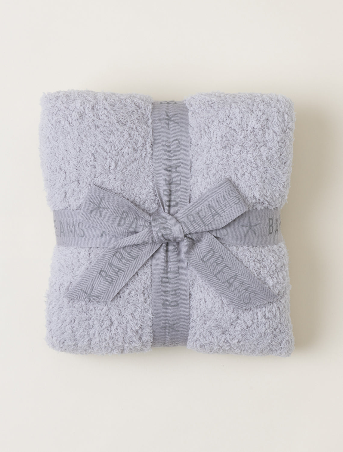 Barefoot Dreams CozyChic stroller blanket in Oyster, soft and plush for baby comfort, shown draped over a stroller.