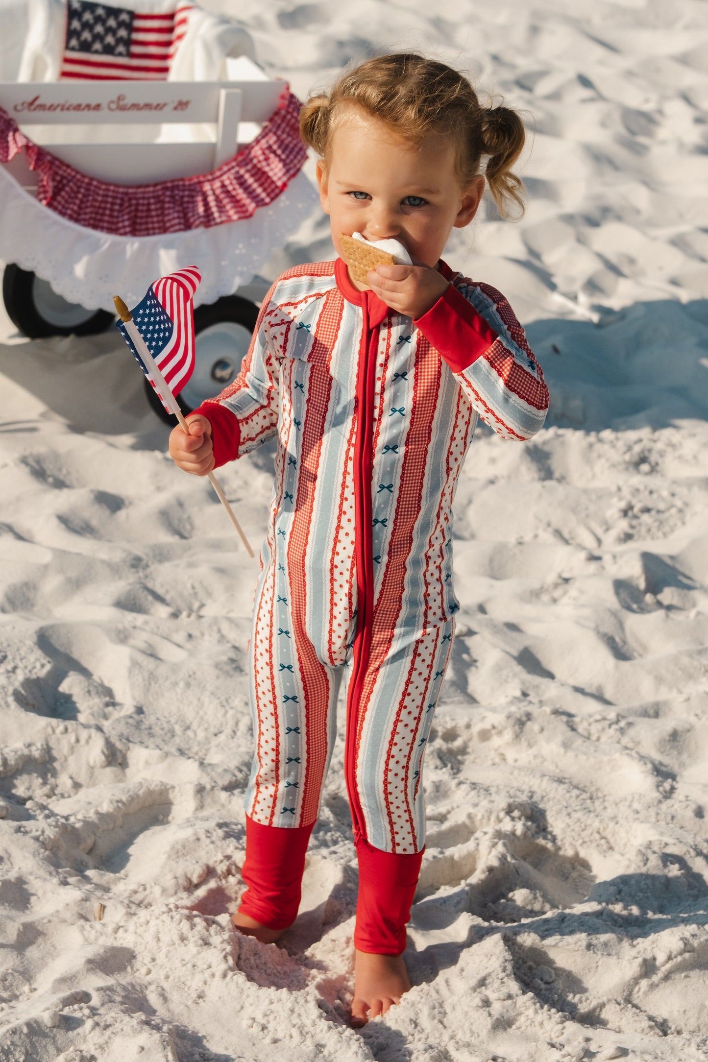 Heritage striped zipper romper by In My Jammers, featuring a colorful striped pattern and front zipper detail.