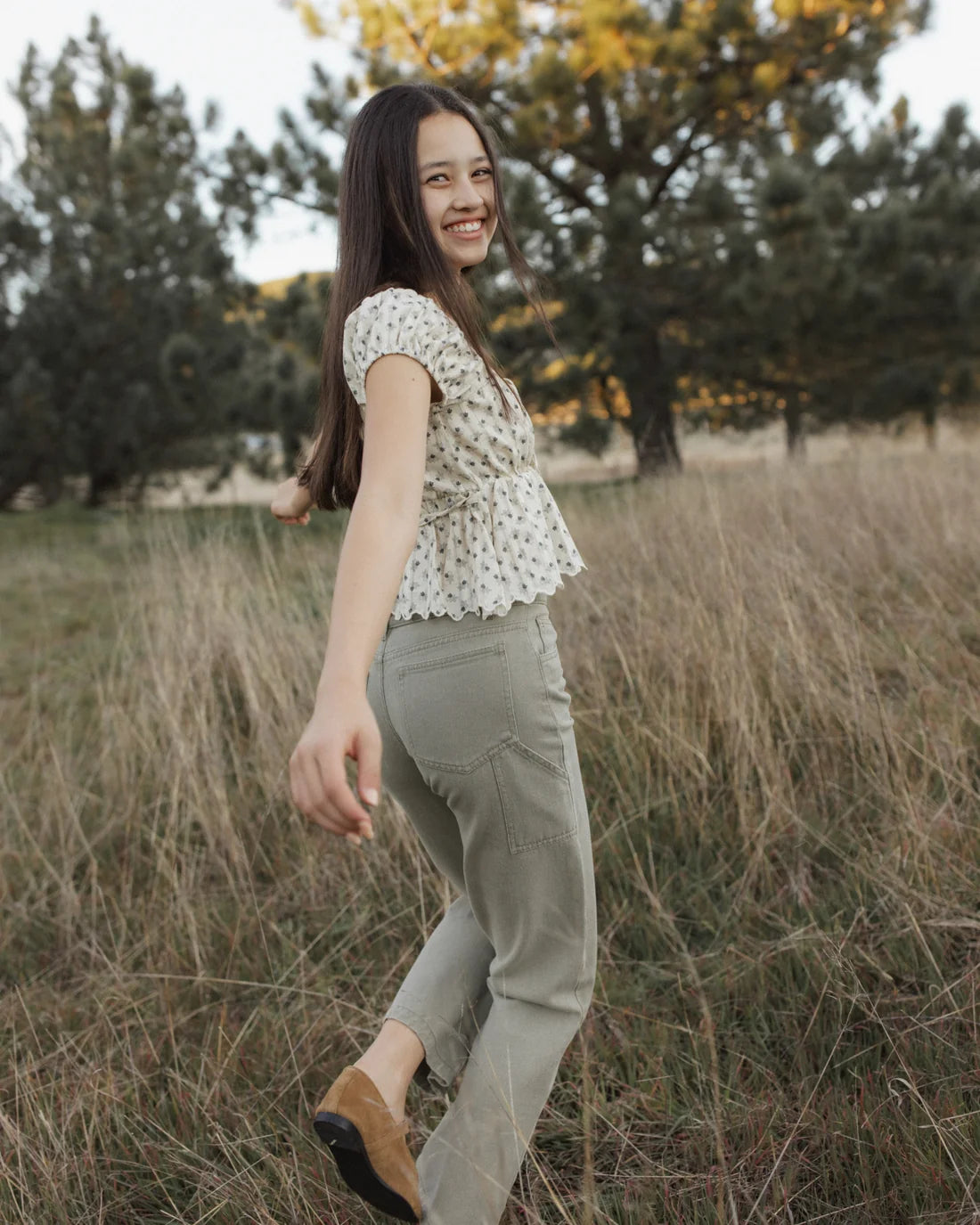 Teen vintage Fleur Rylan top by Rylee & Cru, featuring floral design and casual fit, shown in a lifestyle setting.