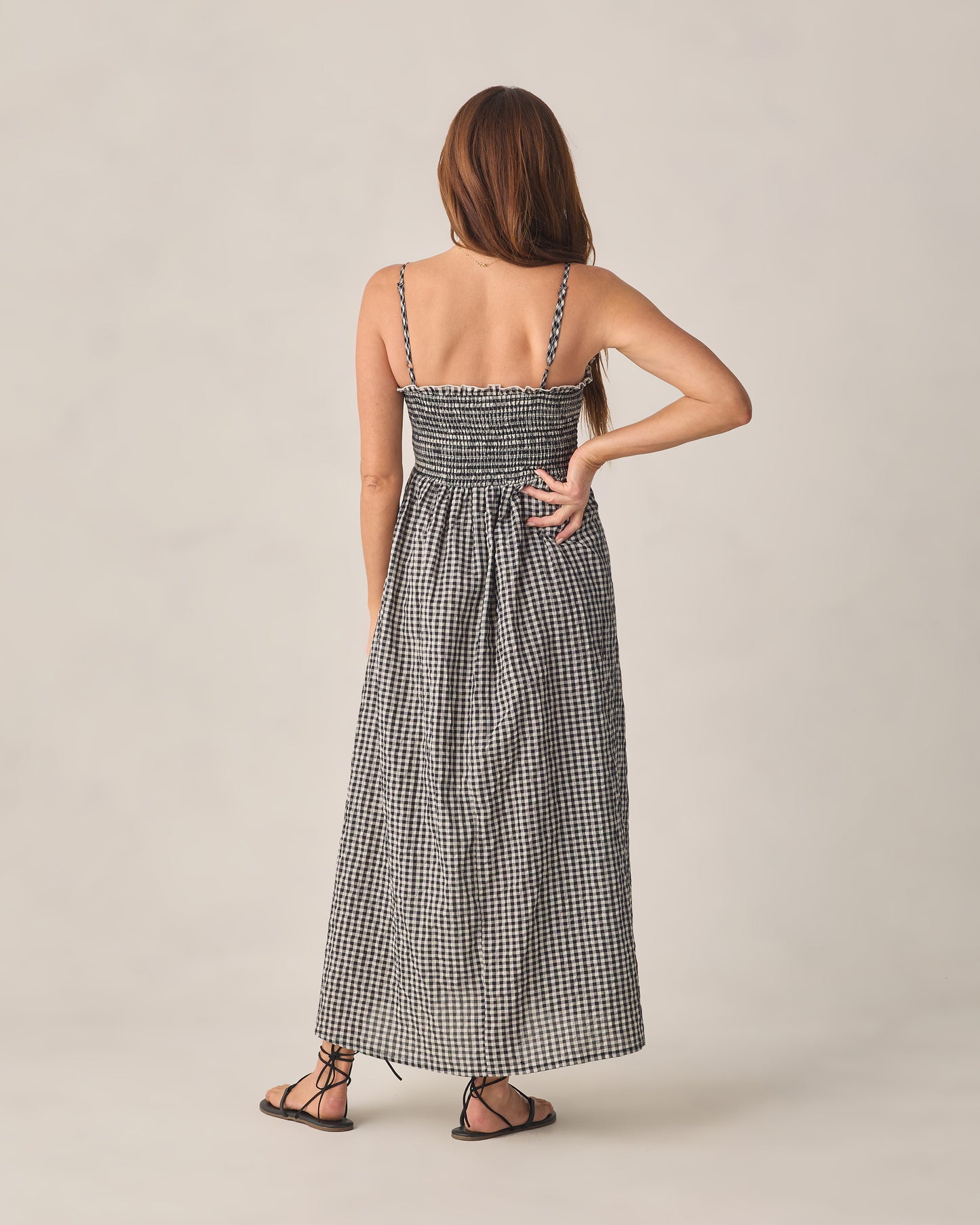 Women's black check Chrissy dress by Rylee & Cru, featuring a stylish check pattern and a flattering fit, shown on a model.