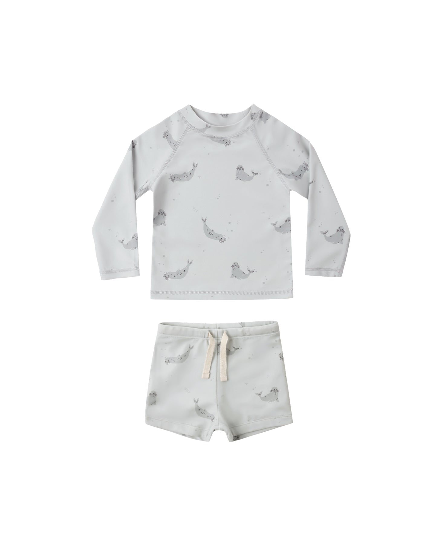 Blue Seals Boys Rashguard Set by Rylee & Cru featuring a long-sleeve rashguard and matching swim shorts for kids.