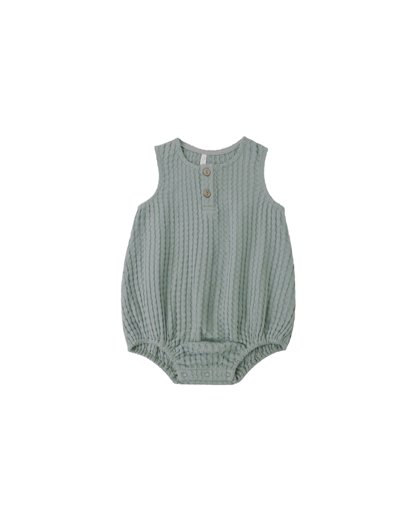 Sea green Rylee & Cru Beau romper displayed on a hanger, featuring soft fabric and short sleeves, perfect for casual wear.