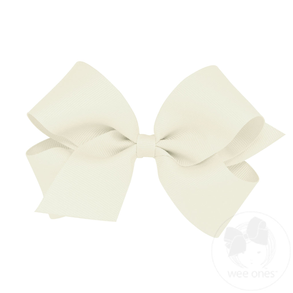 Medium classic grosgrain hair bow by Wee Ones, plain wrap style, shown in a close-up of the plain pink bow on a white background.
