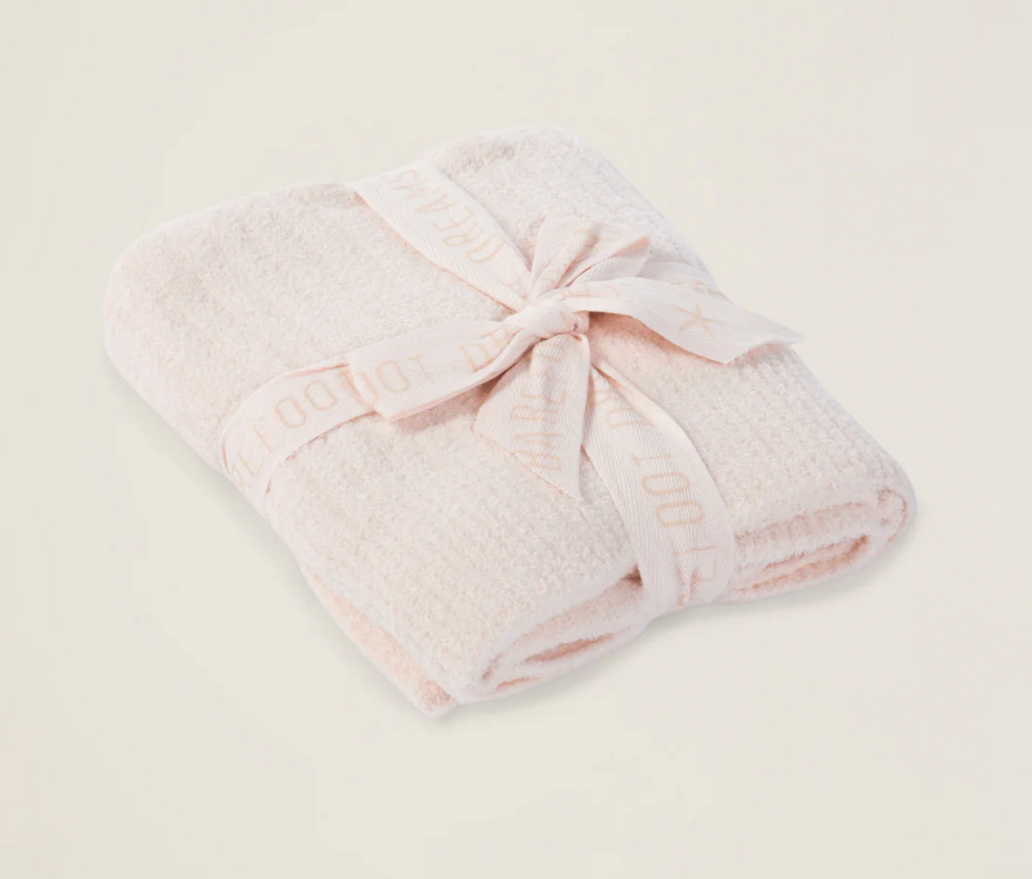 Barefoot Dreams Cozychic Lite ribbed pink baby blanket with soft, cozy fabric and gentle ribbed texture for infants.