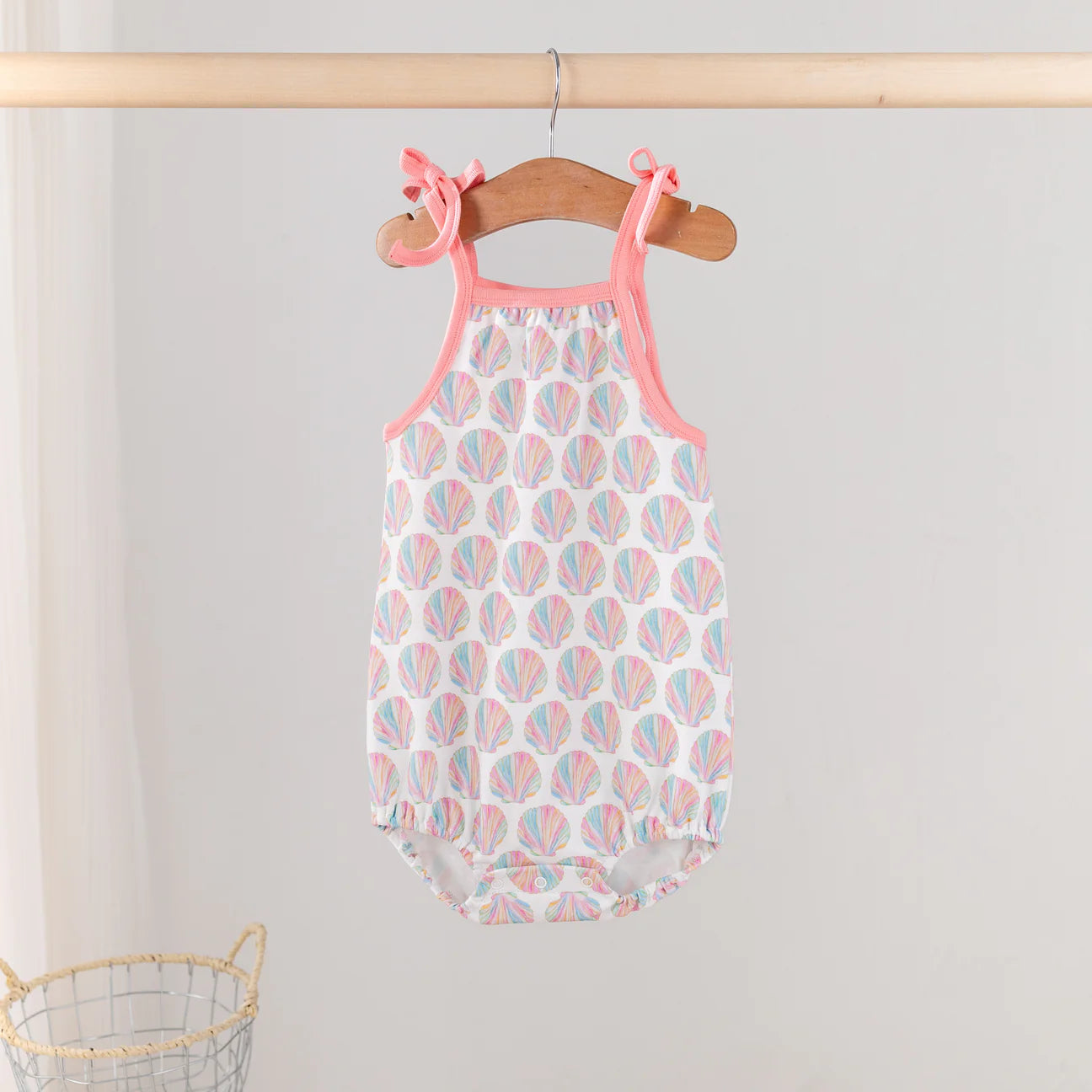 Organic cotton Shell Yeah! shoulder-tie onesie by Nola Tawk featuring a playful shell print and shoulder tie straps for babies.