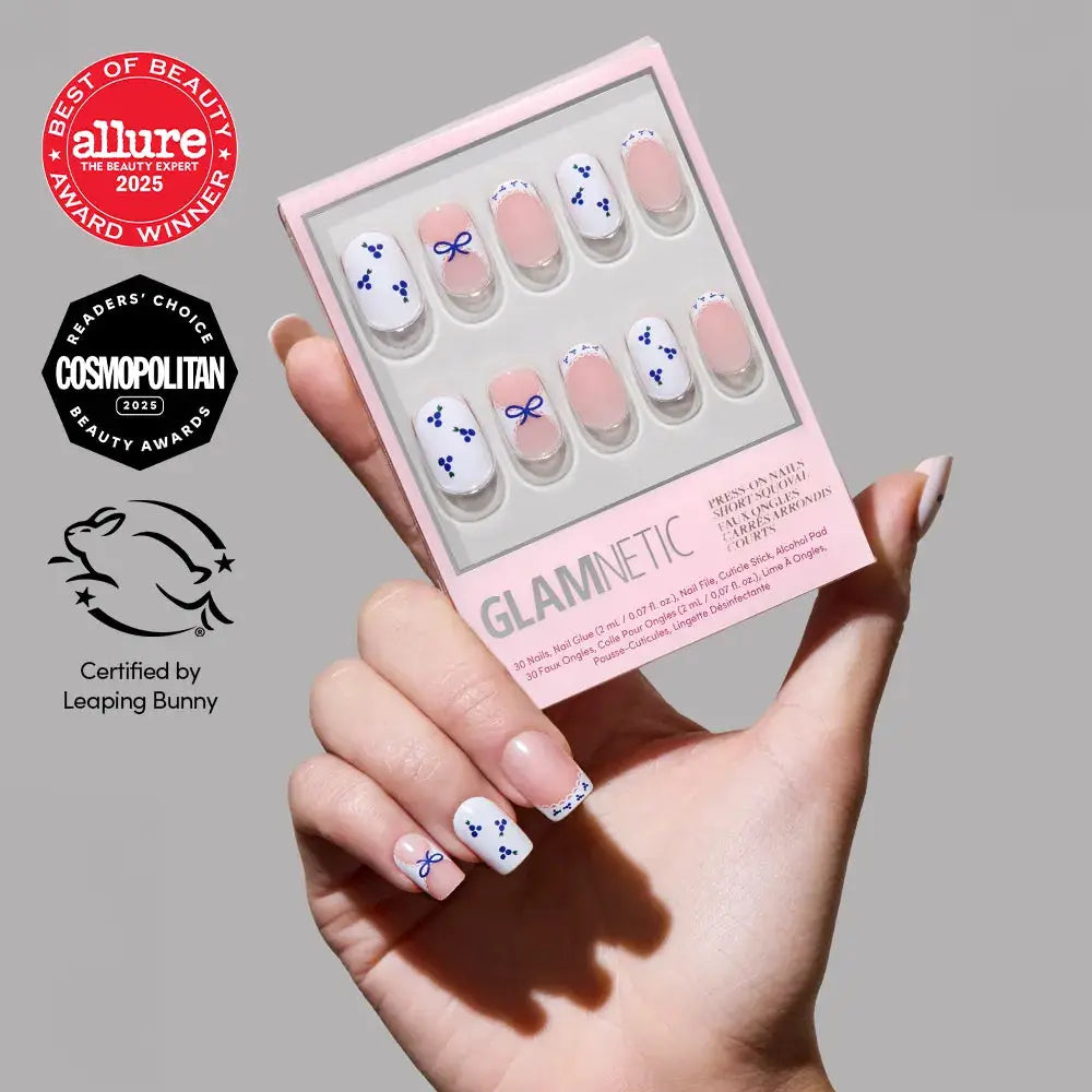 Blue A Kiss press-on nails by Glamnetic, short squoval shape, with a glossy finish and vibrant blue color.