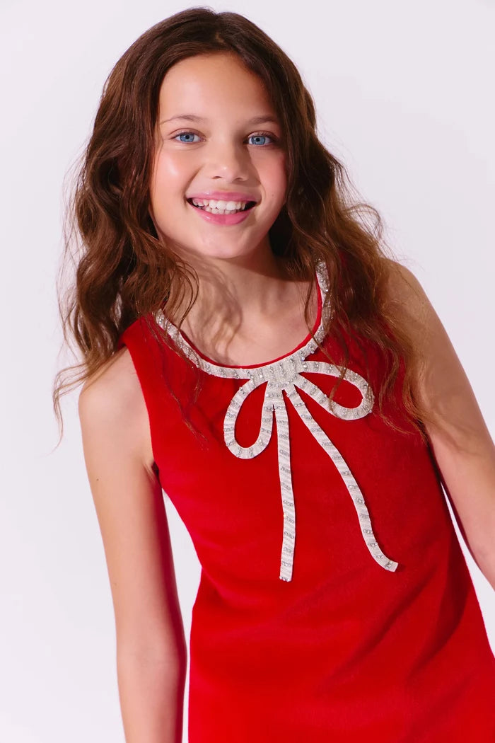 Red velvet princess dress with a bow for girls by Lola and The Boys, featuring a flowing skirt and elegant design.