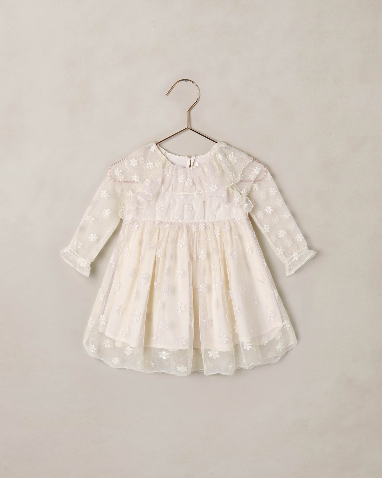 Noralee embroidered Daisy Celine dress featuring delicate floral embroidery and lightweight fabric, perfect for casual or summer wear.