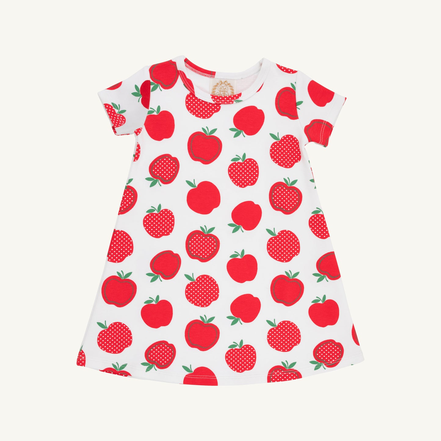 Pink and white Polly play dress for toddlers from The Beaufort Bonnet Company featuring a floral pattern and ruffled sleeves.