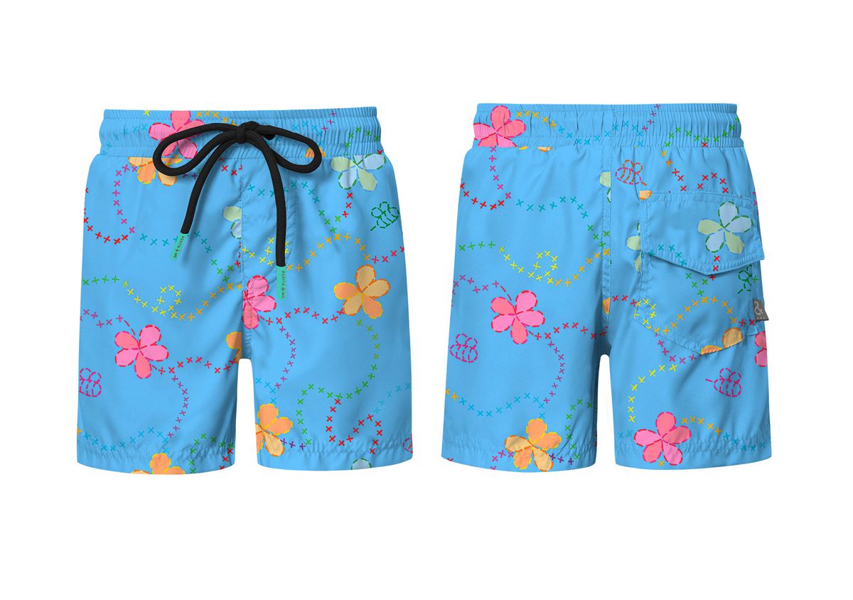 Pepita & Me Piglo Azul swimshorts with elastic waistband and colorful pattern, suitable for kids' beach or pool wear.