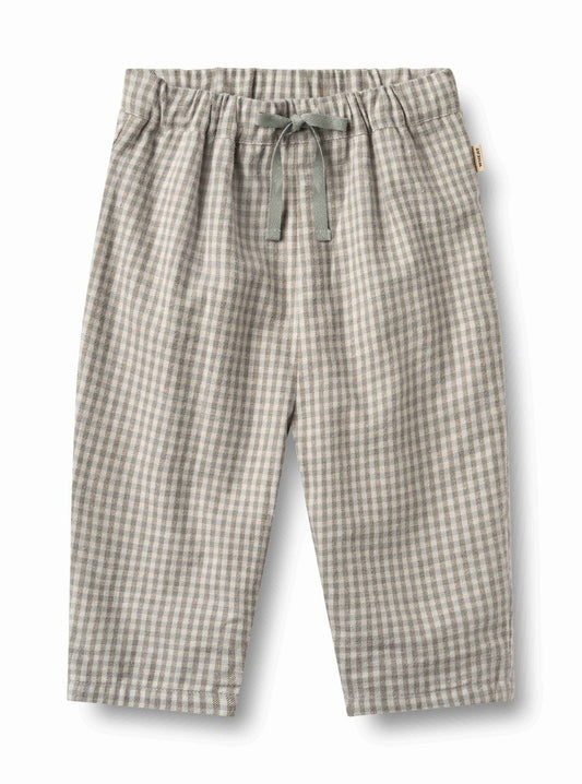 Greybrown check Arne lined trousers by Wheat, shown with waist and front pockets, tailored fit, and check pattern fabric.