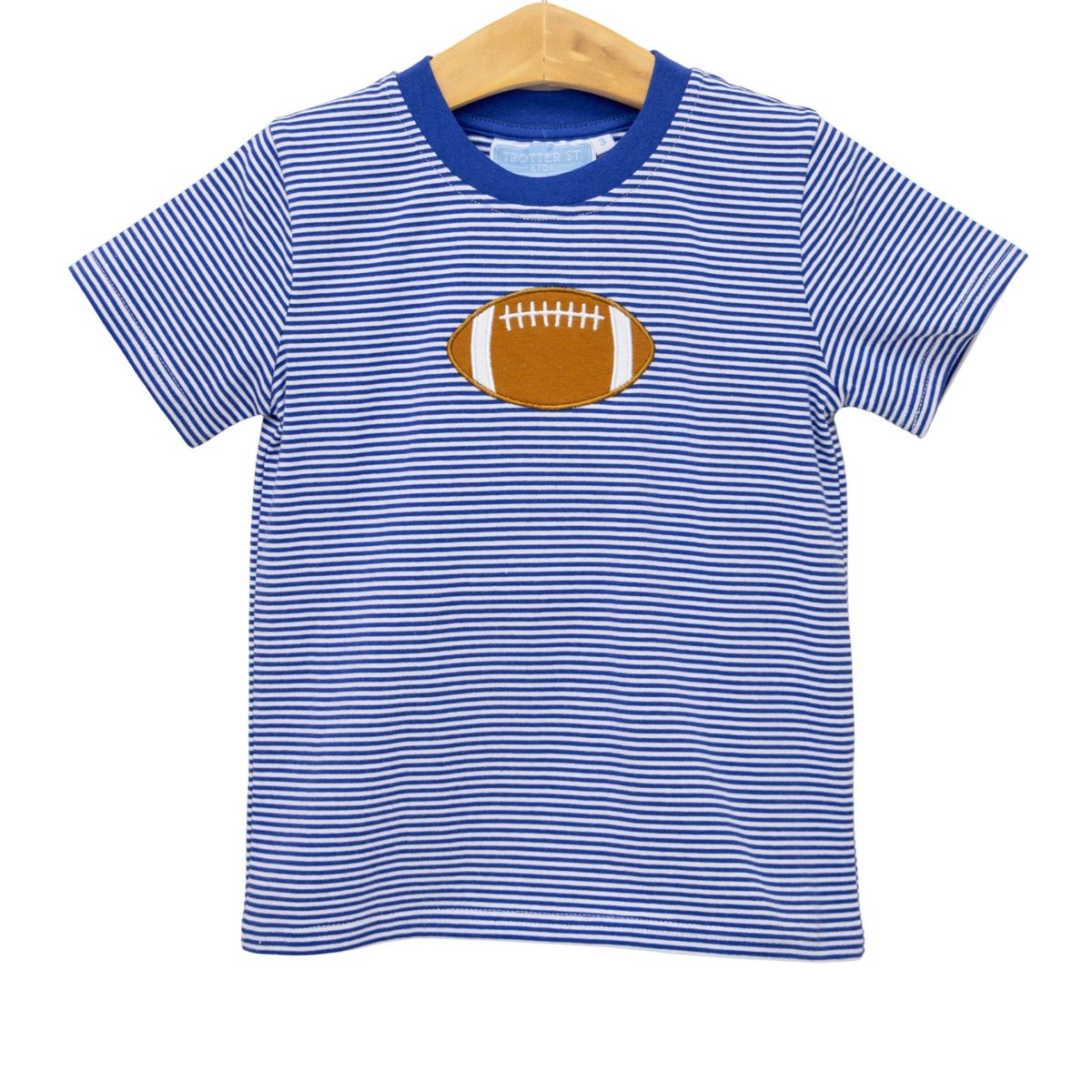 Royal blue and white striped football applique T-shirt by Trotter Street, featuring a casual crew neck and sporty design.