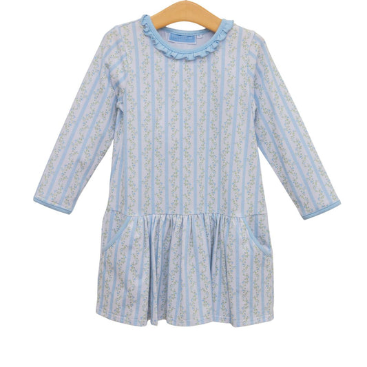 Trotter Street Vineyard Blooms dress featuring a floral pattern, sleeveless design, and flowing fabric on a model.
