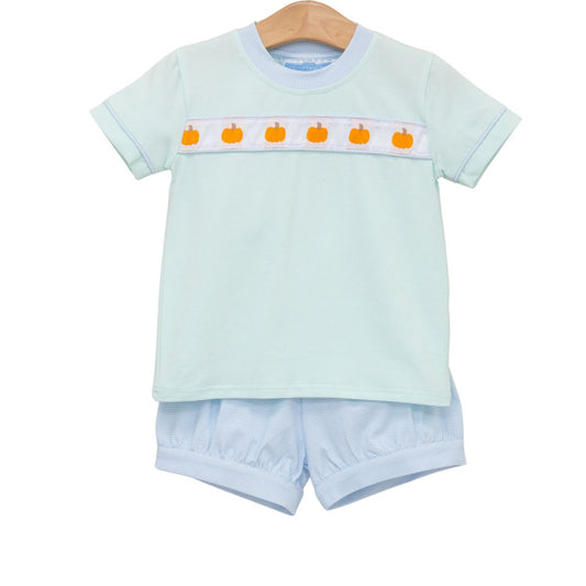 Trotter Street Pumpkin Rowe Banded Short Set displayed on a model, featuring a stylish coordinated top and shorts in autumn-inspired colors.