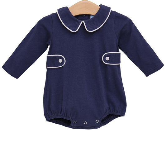 Navy Elijah Bubble from Trotter Street featuring a stylish, puffy jacket with a shiny finish and quilted design.