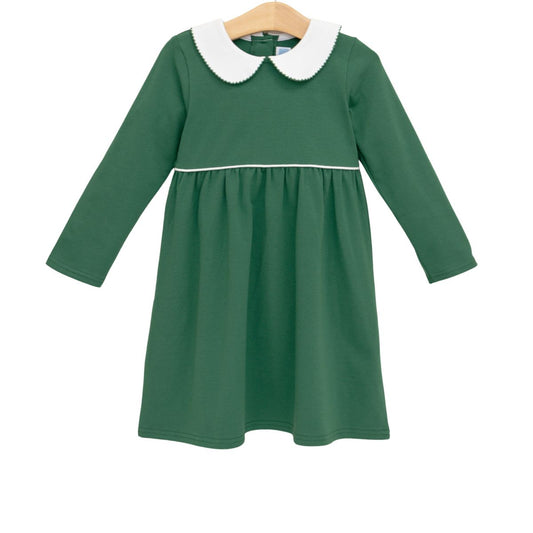 Hunter green Claire dress by Trotter Street, featuring a fitted silhouette and elegant neckline, displayed on a hanger.