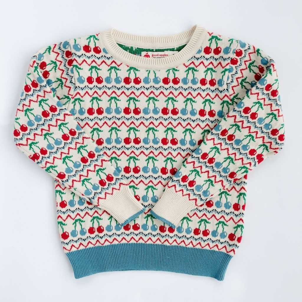 Good Apples Heritage Cherries Pullover in cozy knit fabric, featuring a cherry pattern and ribbed cuffs and hem.