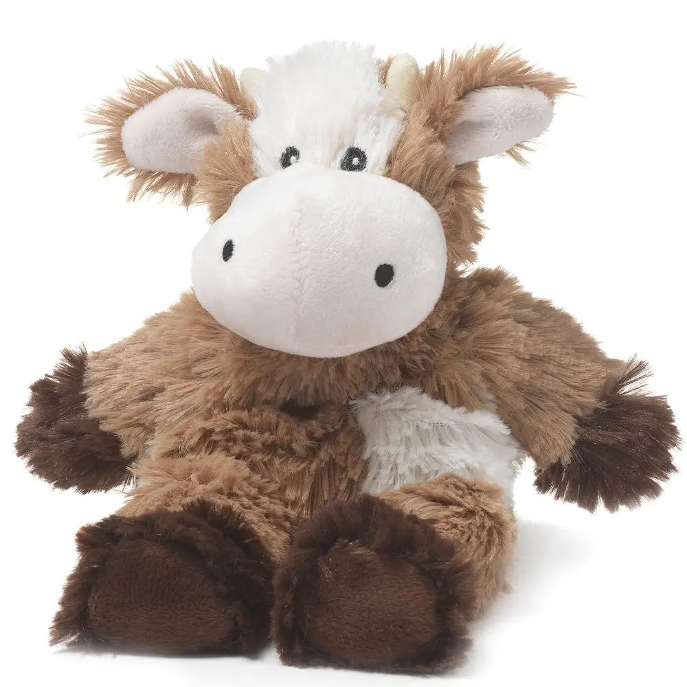 Warmies Cow Junior plush toy with soft fabric and embroidered facial features, designed for comfort and cuddling.