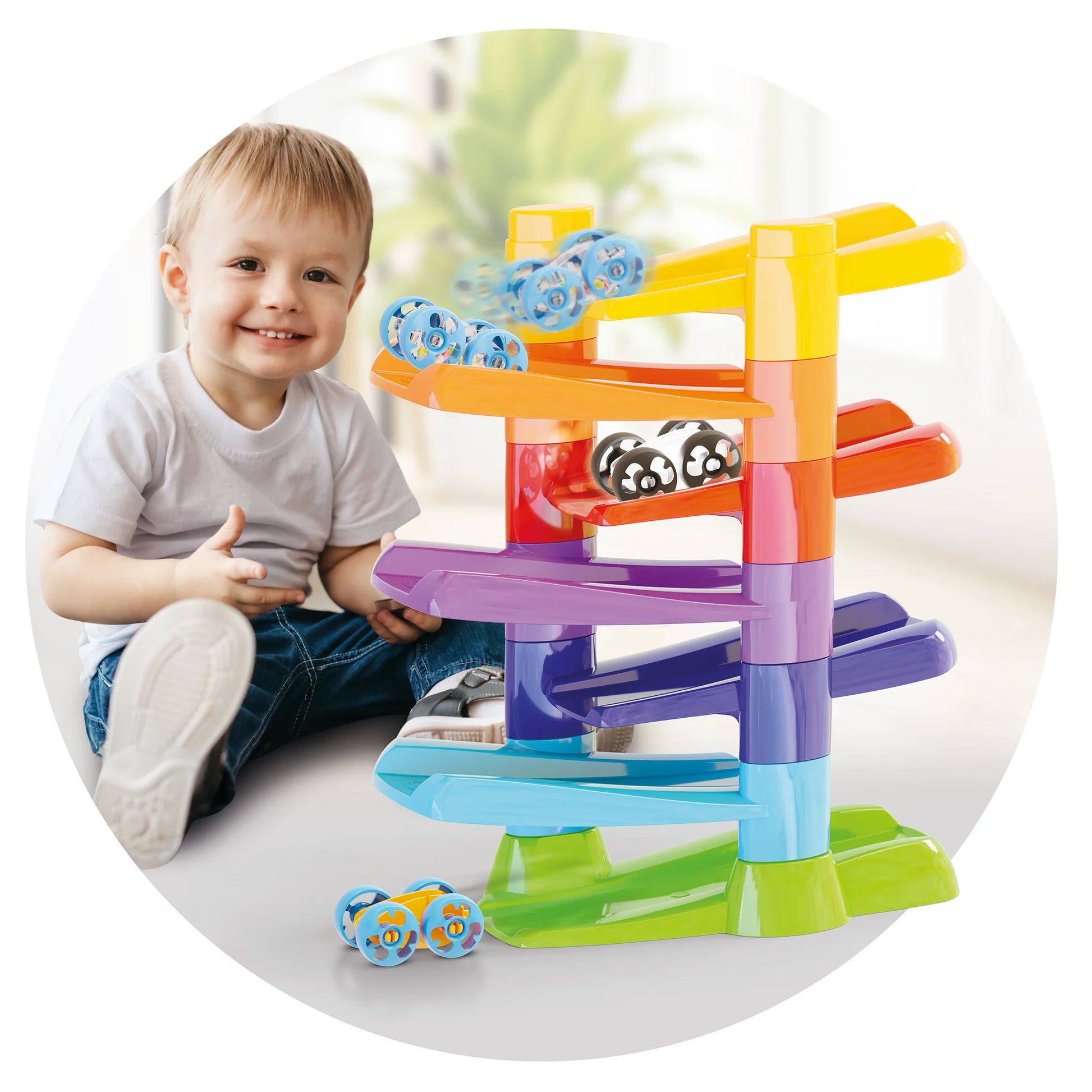 Quercetti Flip Car Race Track with colorful track pieces and racing cars designed for children to play and race.