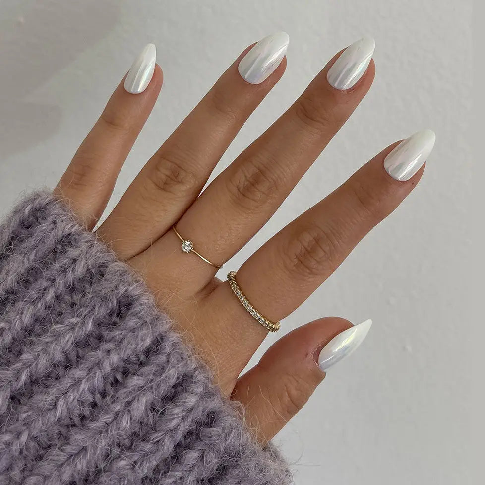 Pearlescent white Moonlight press-on nails by Glamnetic, showcasing glossy, elegant nail design with a smooth, shiny finish.