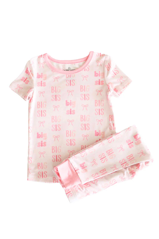 Caden Lane Big Sis two-piece pajama set featuring a soft, cozy fabric and playful design for comfortable sleepwear.