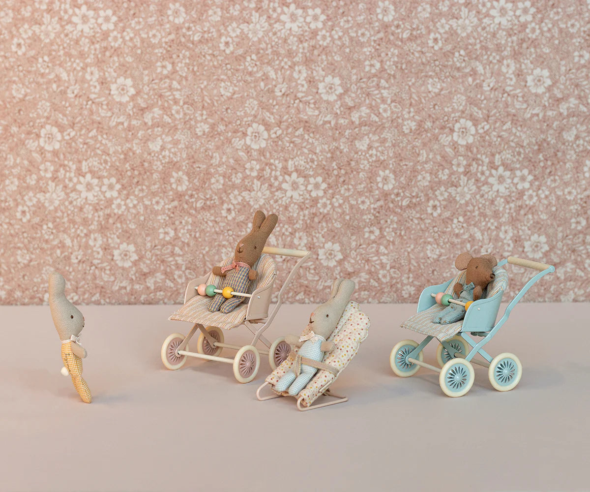 Maileg Baby Mouse stroller in rose color, featuring a cute toy baby mouse inside, ideal for imaginative play.