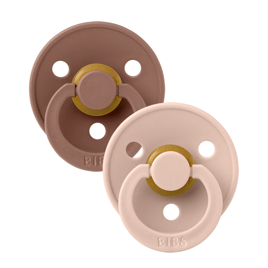 BIBS Pacifier 2-pack in Woodchuck and Blush colors, featuring natural rubber nipple and rounded shield for babies.