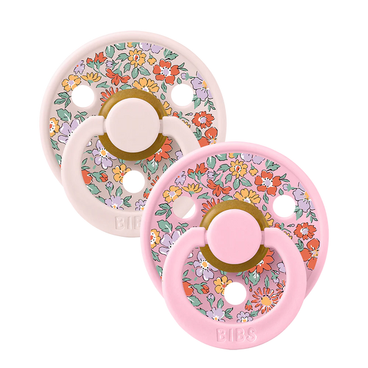 BIBS Pacifier 2-pack Oscar Meadow Petal Mix with colorful silicone baby pacifiers on a white background