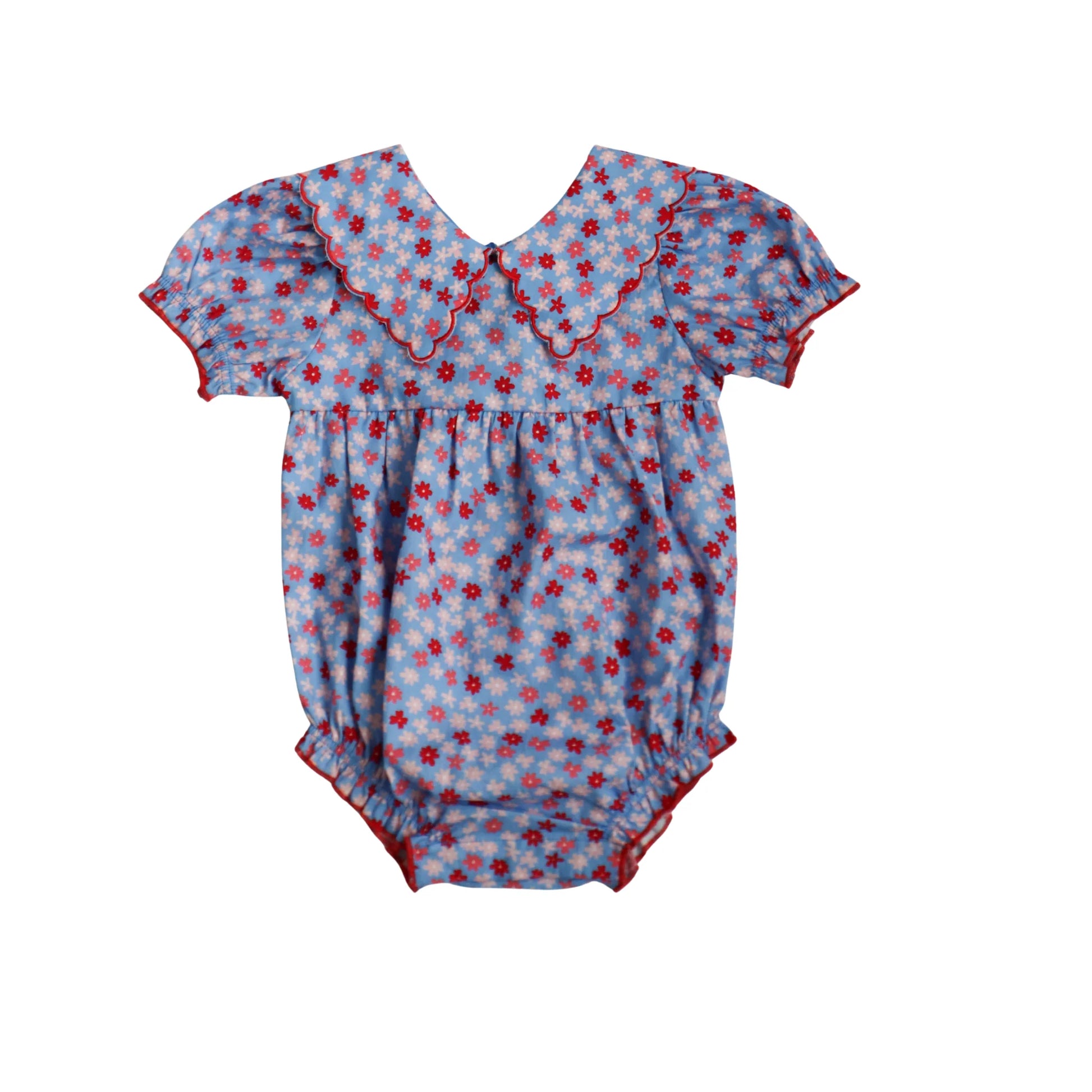 Blue Ditsy Floral Conley Bubble dress by Hollis Baker, showing a close-up of the lightweight fabric and floral pattern.