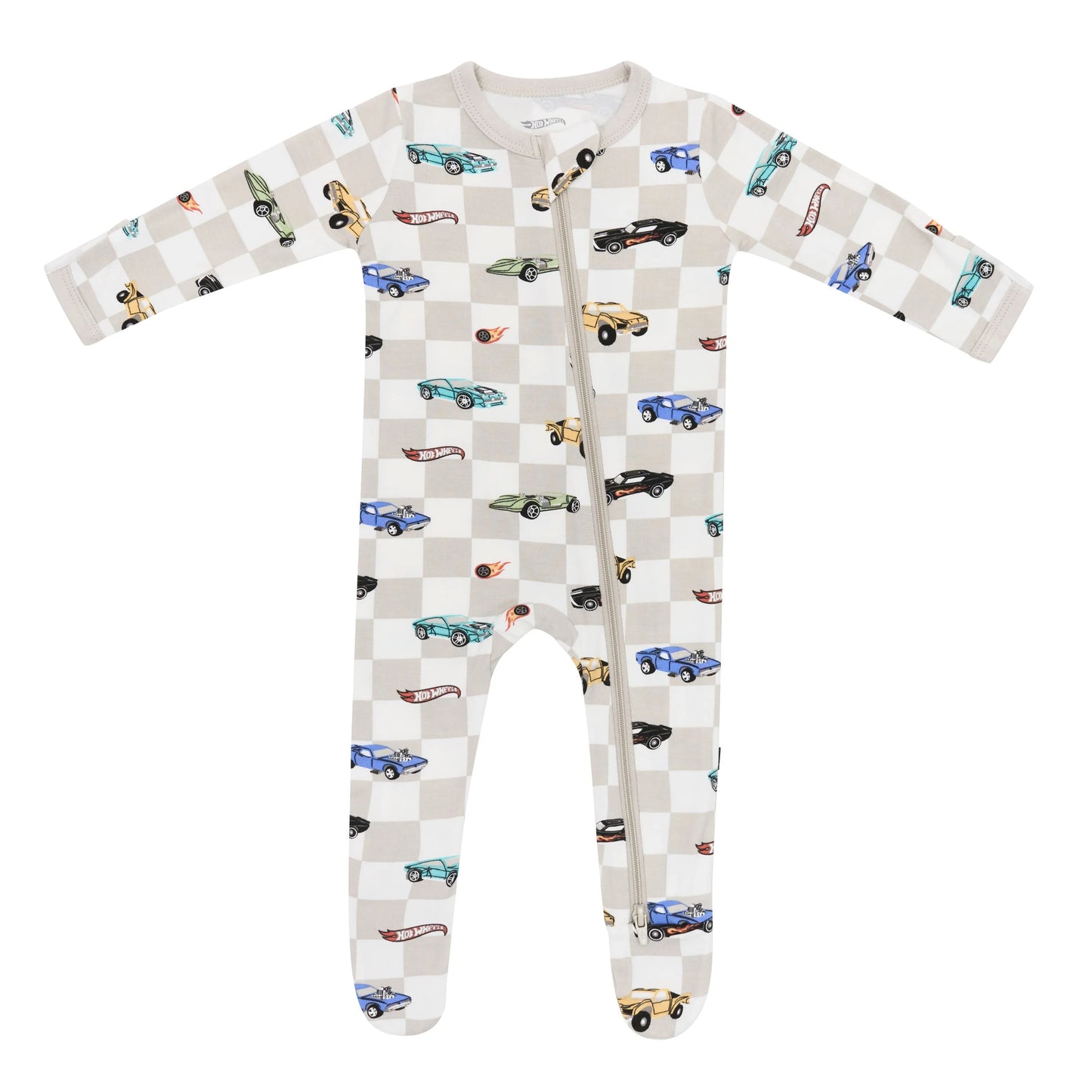 Kyte Baby zippered footie in Fast and Fierce print, soft fabric, with front zipper and enclosed feet for cozy comfort.