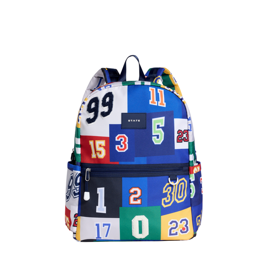 State Bags Kane varsity numbers double pocket backpack with adjustable straps and large front pockets for school or casual use.