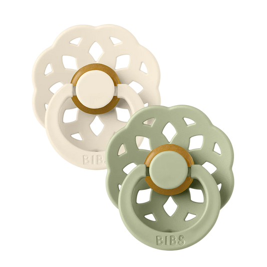 BIBS Boheme Pacifiers 2 Pack in ivory and sage with smooth silicone nipples and colorful, rounded shield for infants.