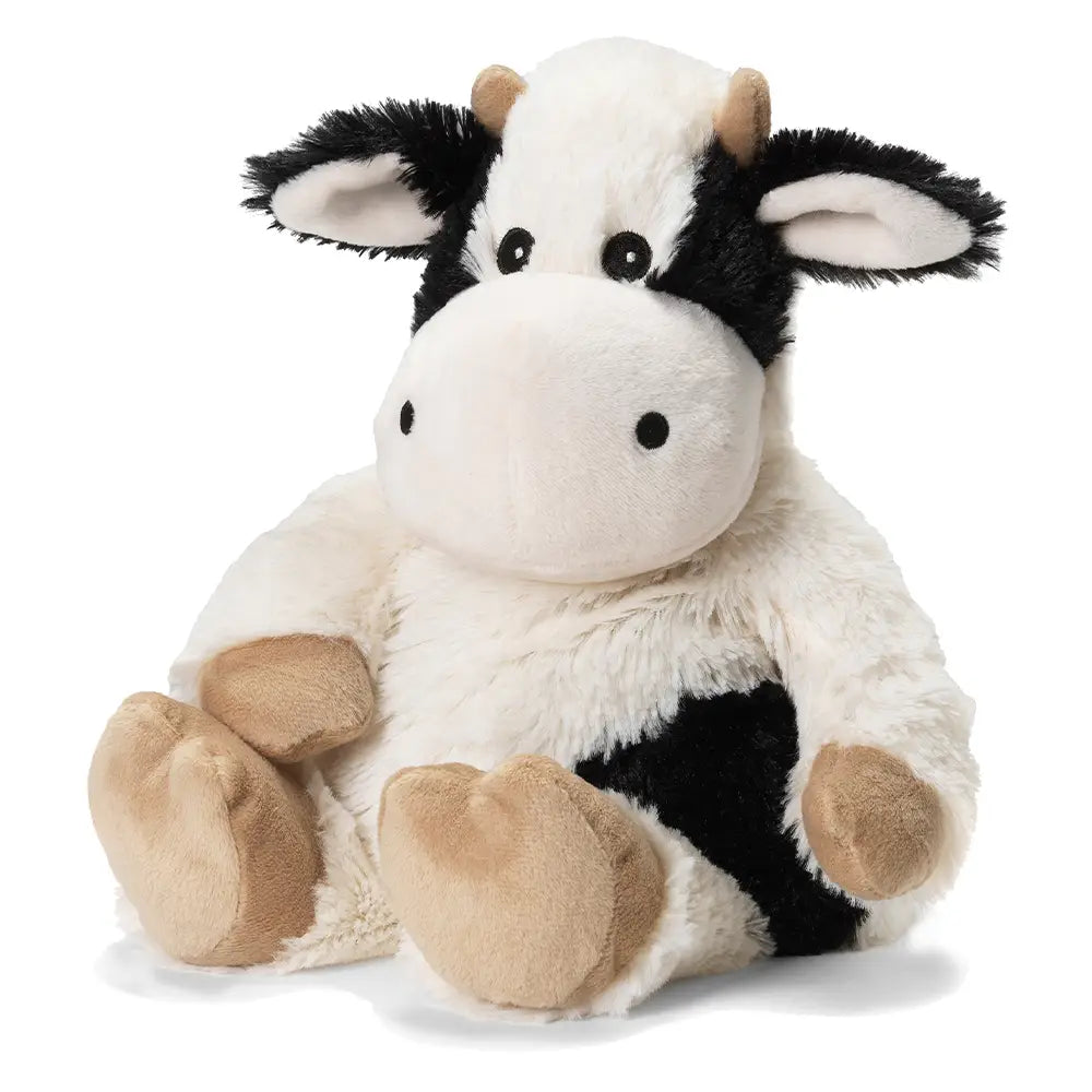 Warmies black and white cow plush toy with detailed cow features and soft fabric, perfect for cuddling and comfort.