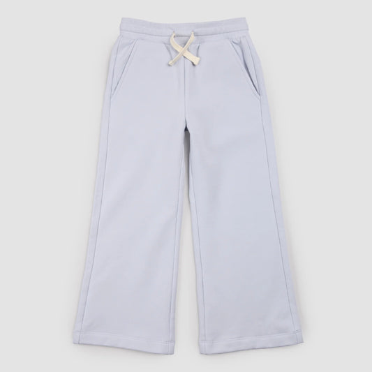 Powder blue wide-leg joggers by Miles the Label, featuring a relaxed fit and comfortable waistband, shown on a hanger.