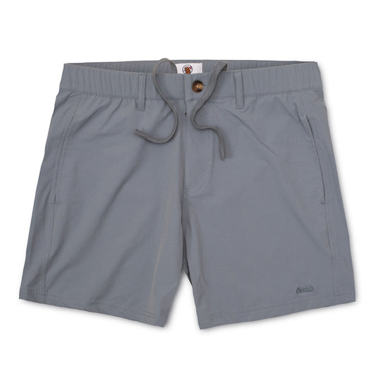 Caddie Youth Swing Shorts in slate color, lightweight athletic shorts with breathable fabric and an elastic waistband for active wear.