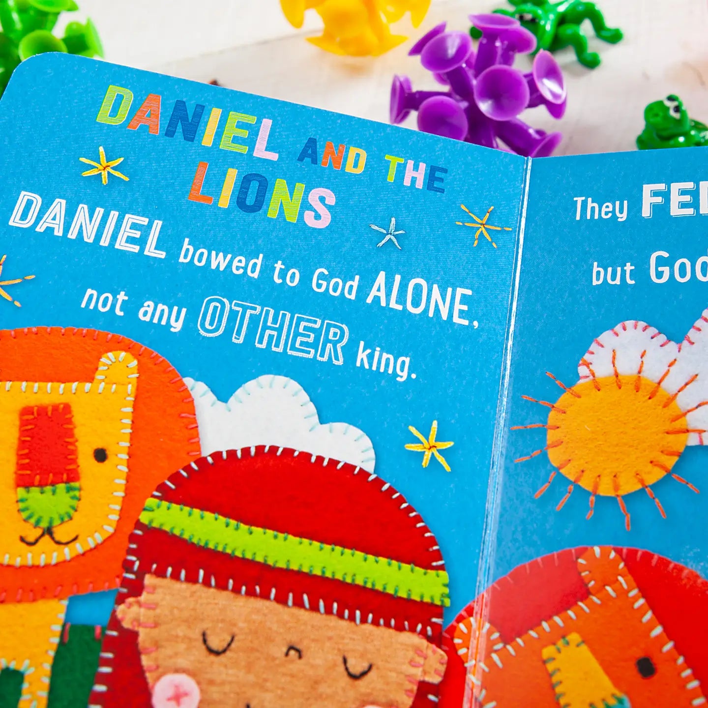 Open children's Bible featuring colorful illustrations from "My First Bible Stories" by BroadStreet Publishing Group.