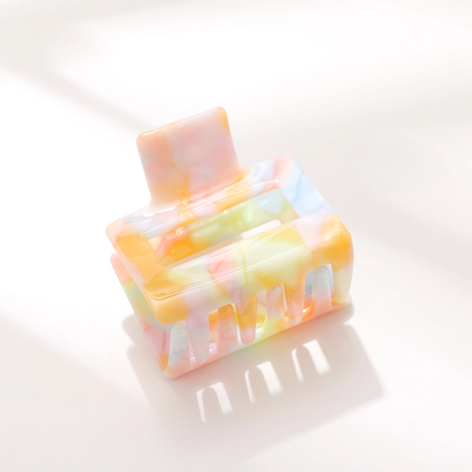 Pastel watercolor hair clip with floral design, perfect for children's hairstyles, from Sweet E's Children's Boutique