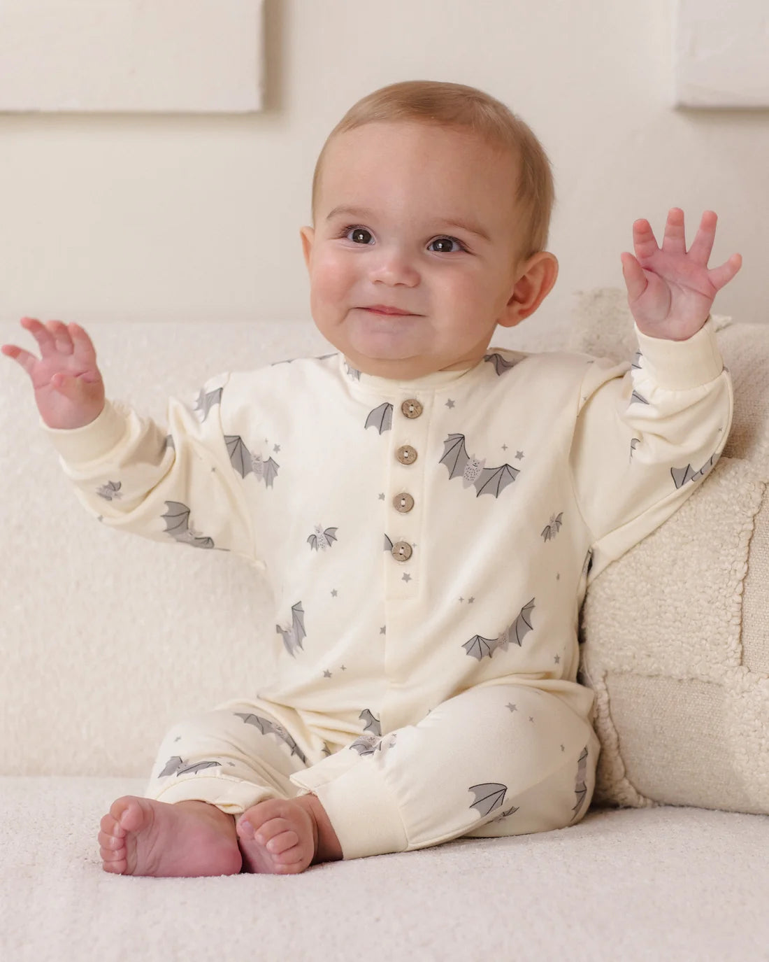 Baby Bats relaxed fleece jumpsuit by Quincy Mae, soft gray sleepwear with bat pattern, cozy and comfortable for infants.
