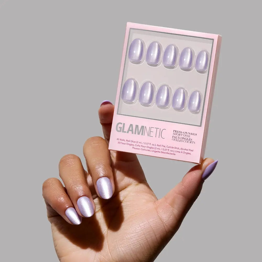 Short oval purple iridescent Mermaid's Tail press-on nails by Glamnetic, showcasing glossy, shimmering nail tips with a mermaid-inspired design.