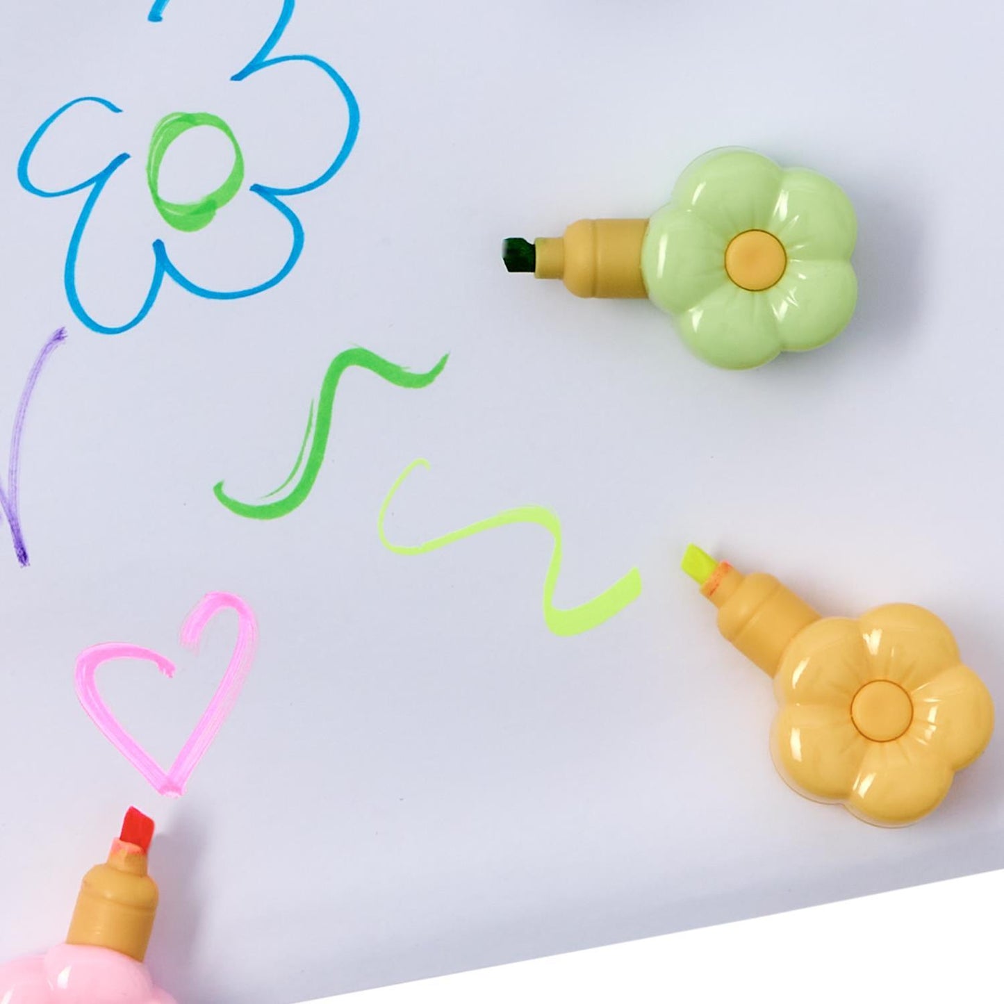 Set of four Twos Company Flower Power Stackable Flower Highlighters with colorful floral designs and ergonomic grip.