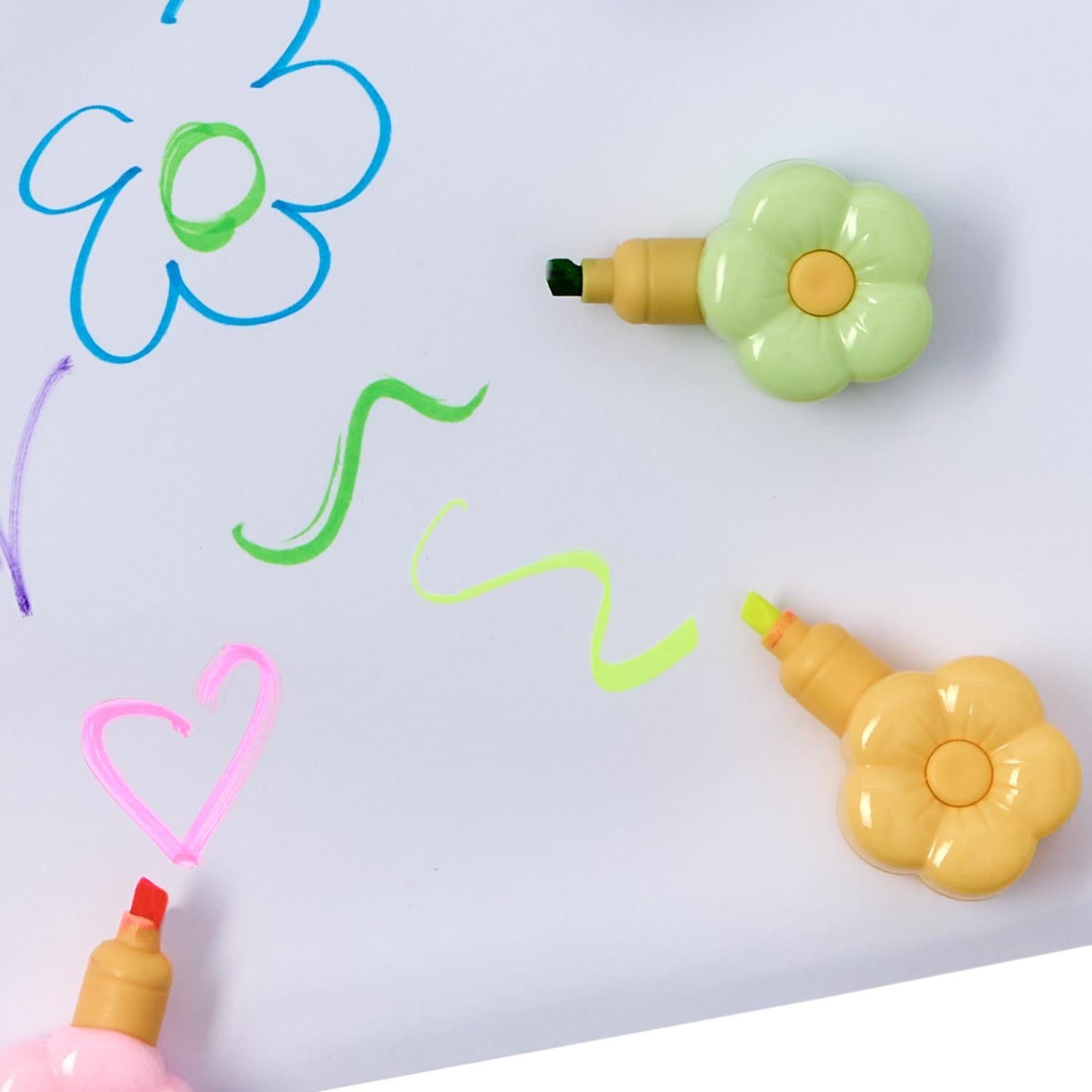 Set of four Twos Company Flower Power Stackable Flower Highlighters with colorful floral designs and ergonomic grip.
